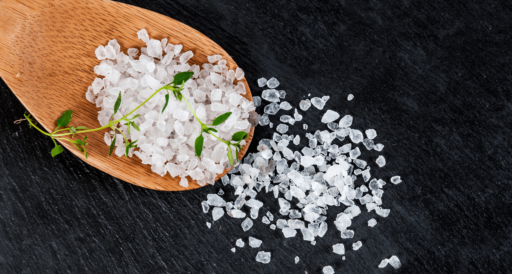 salt on wooden spoon