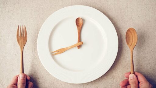 mini wooden cutlery with empty plate